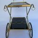 Vintage 1960's bar rolling table smoked glass gilded metal