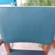 pair of dark green bridge armchairs