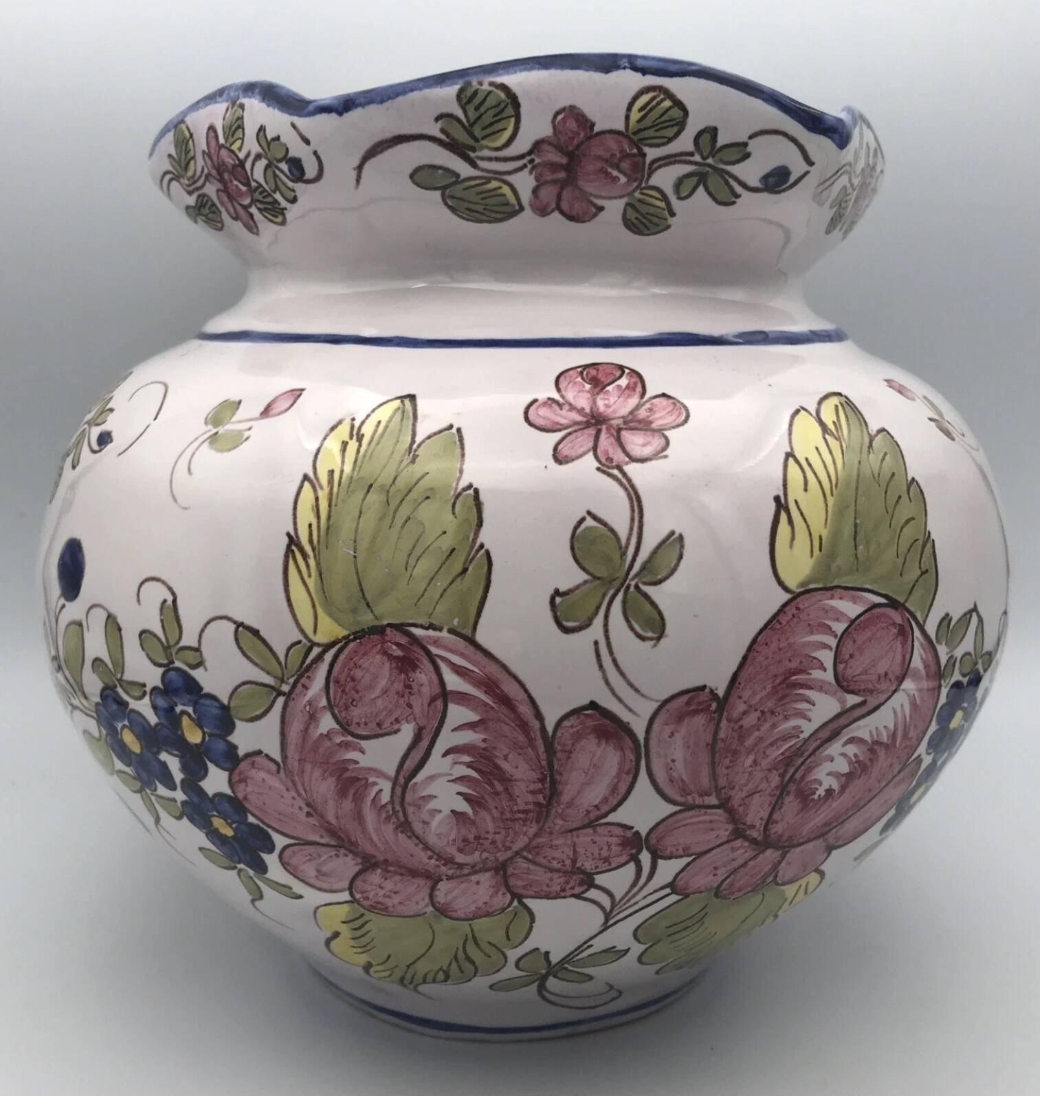 Round earthenware vase with polychrome floral motifs, signed