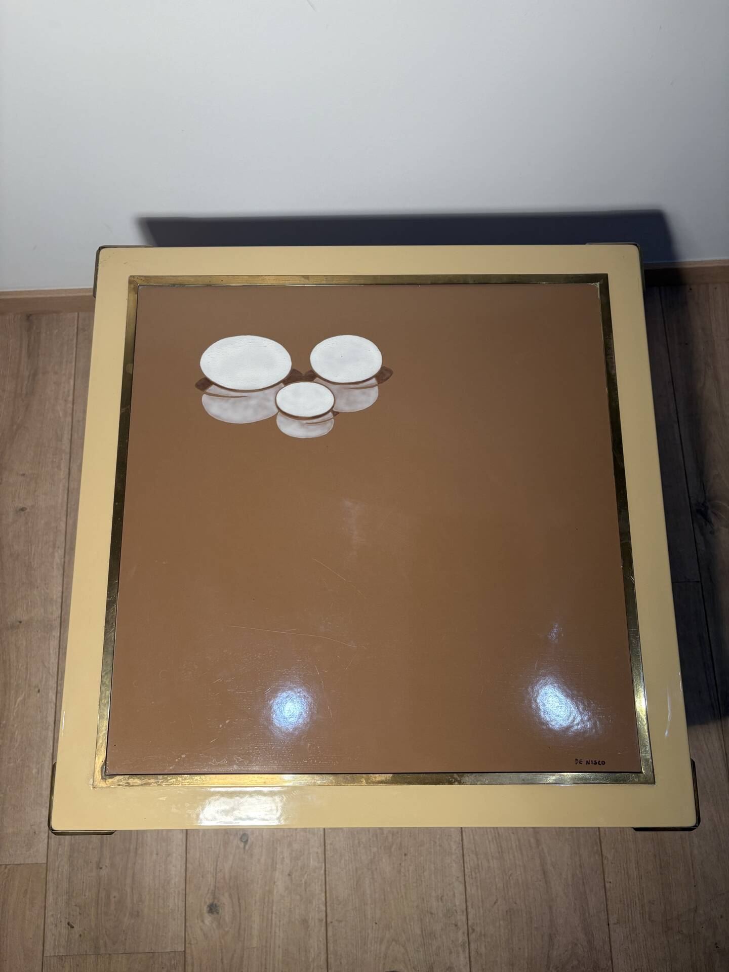 Metal and brass coffee table in ceramic by Nisco.