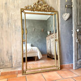 Antique gilded mirror with parcloses from the 19th century.