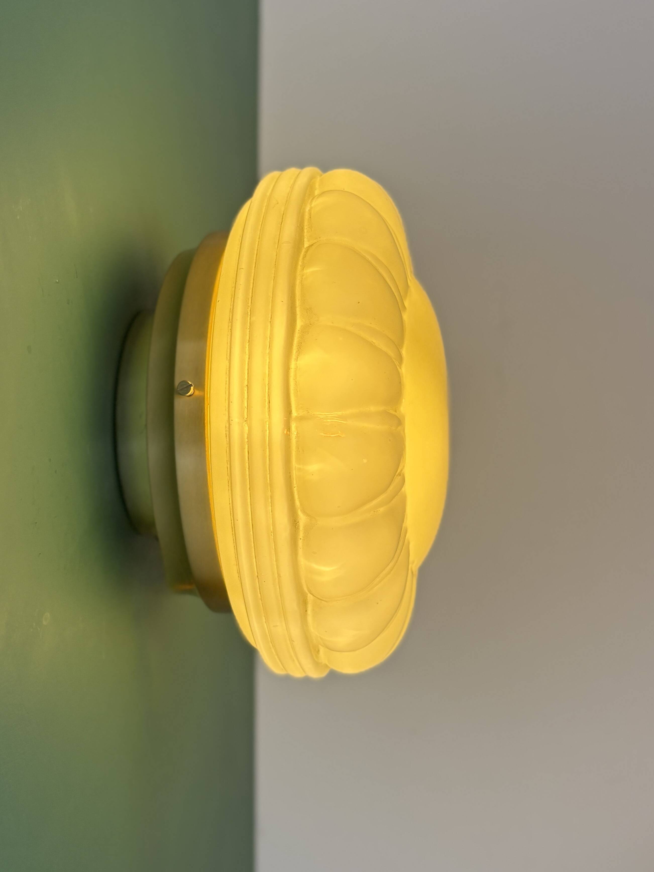 Vintage Art Deco globe wall or ceiling light in yellow opaline.