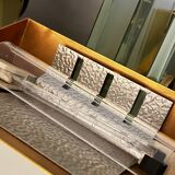 Pair of Hollywood Regency wall lights, bases & reflectors in gilded brass