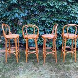 Set of four cane and webbing bar stools
