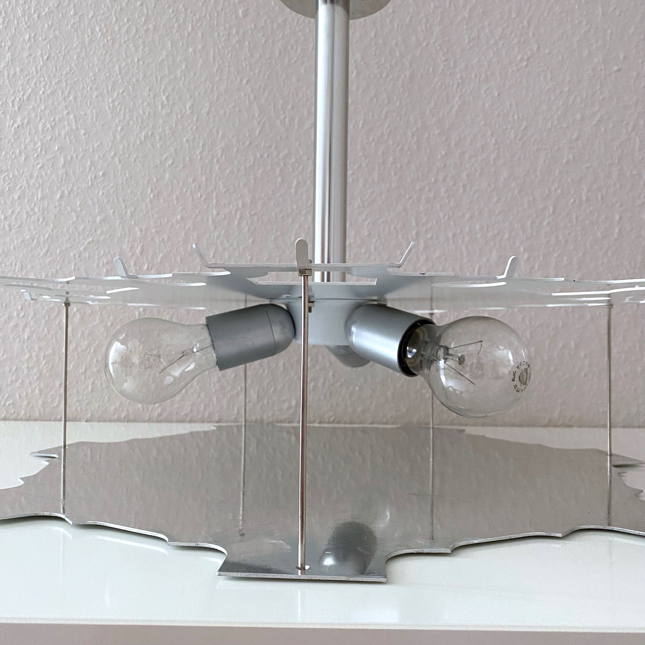 Glass chandelier by Doria Leuchten 1960s mid century lamp, vintage interior.