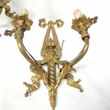 Pair of antique bronze wall lights. Louis style candlestick lamps.