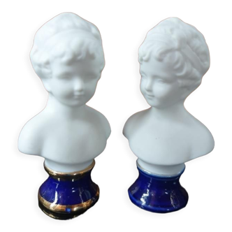 Pair of children's busts in blue lapis lazuli biscuit