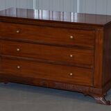 Set of hardwood dressers with finely carved bases.