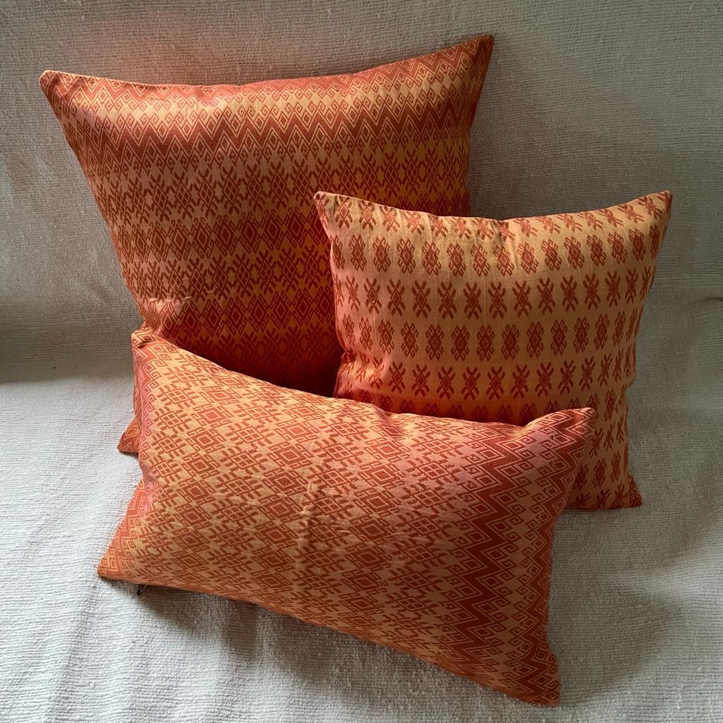 Glossy orange Kachin cushion 50x50 cm