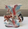 Ancien vase en barbotine polychrome décor biche et écureuil