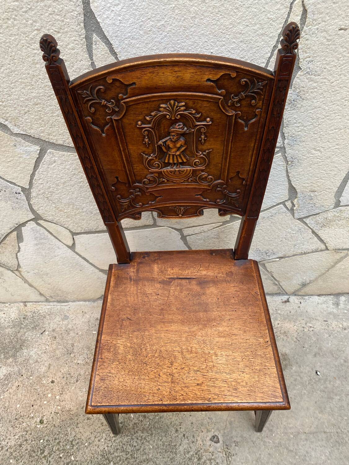 Carved walnut lounge chair
