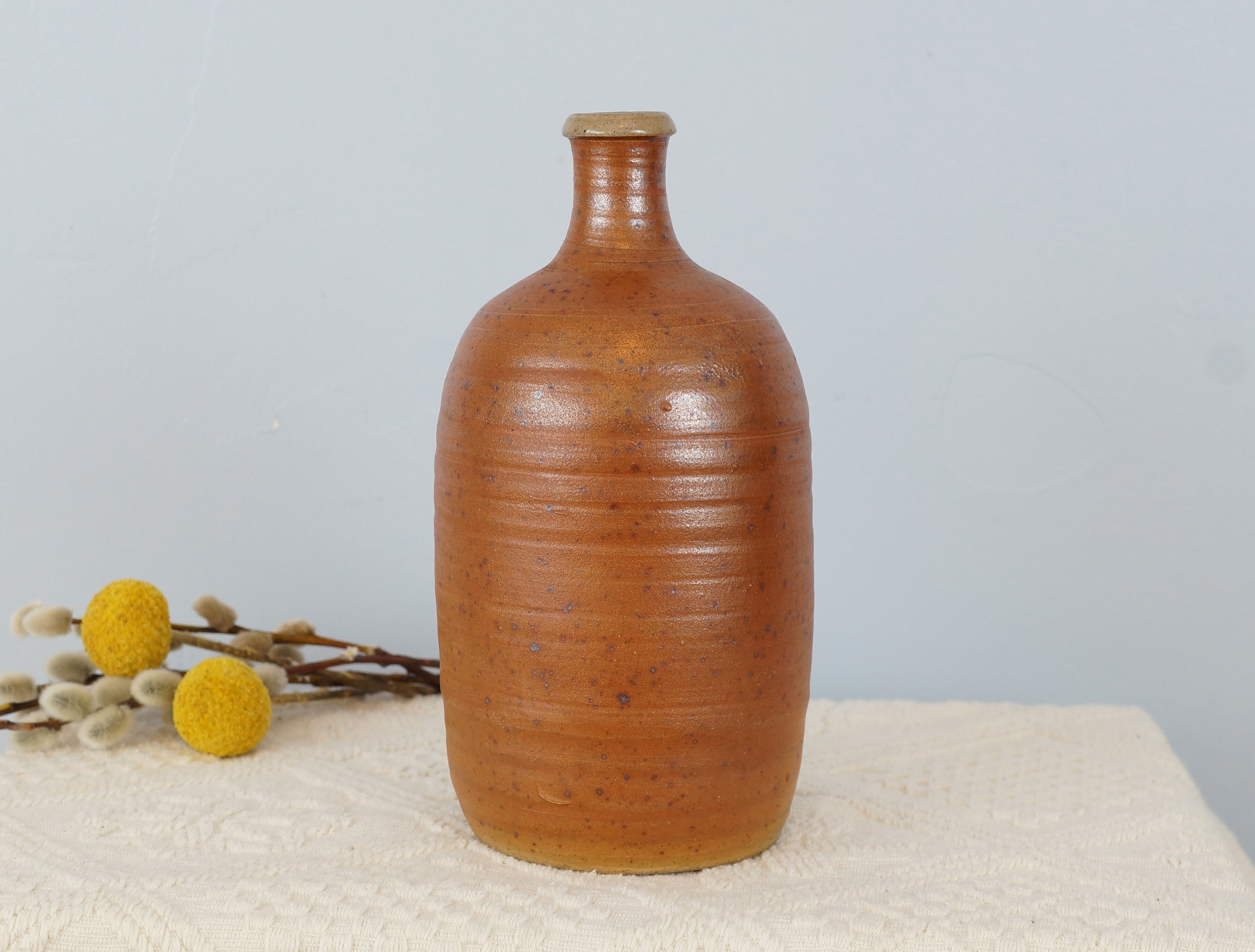 Bottle of vintage stoneware corsican brandy