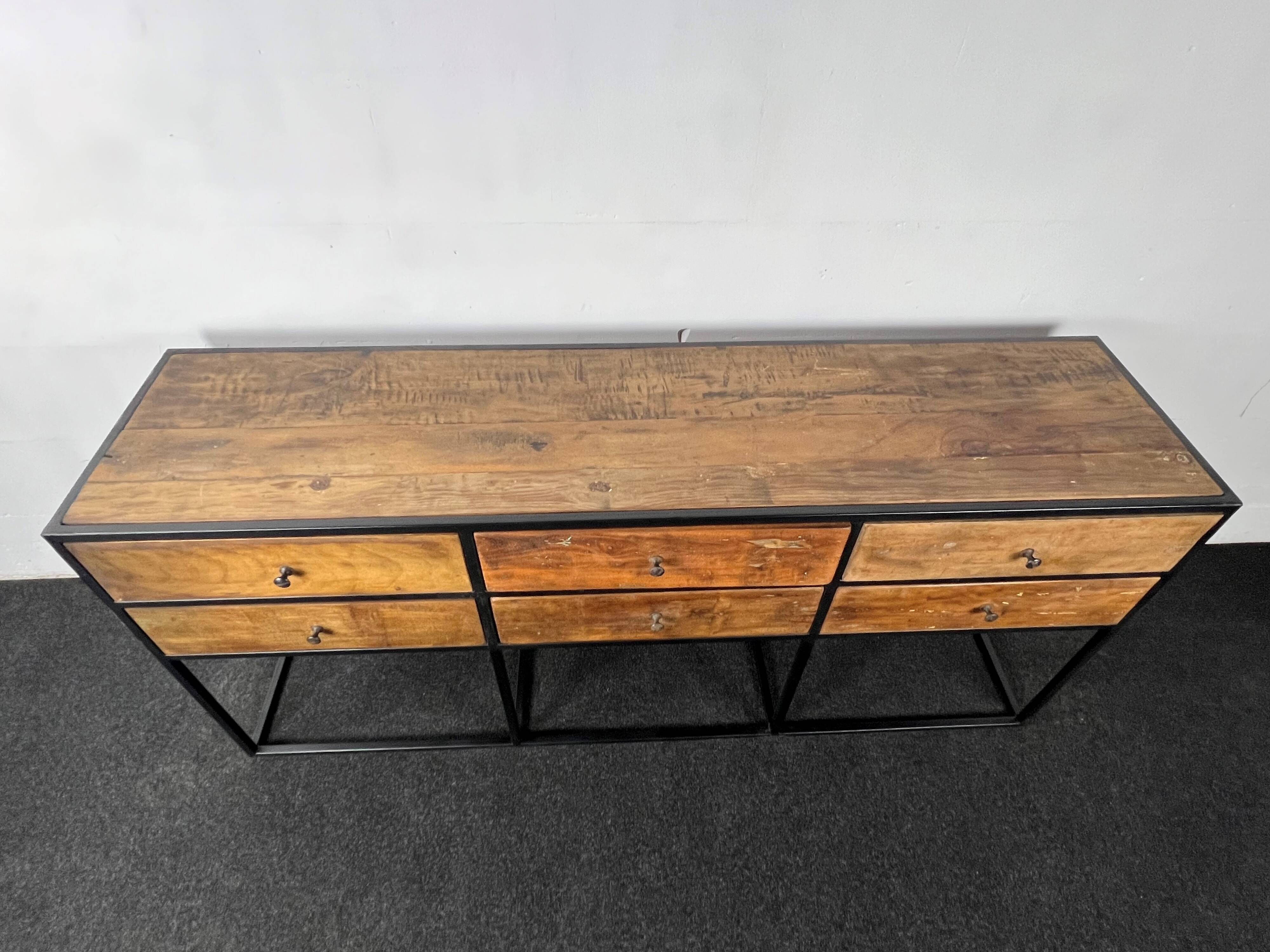 Antique wooden console with black metal base and 6 drawers