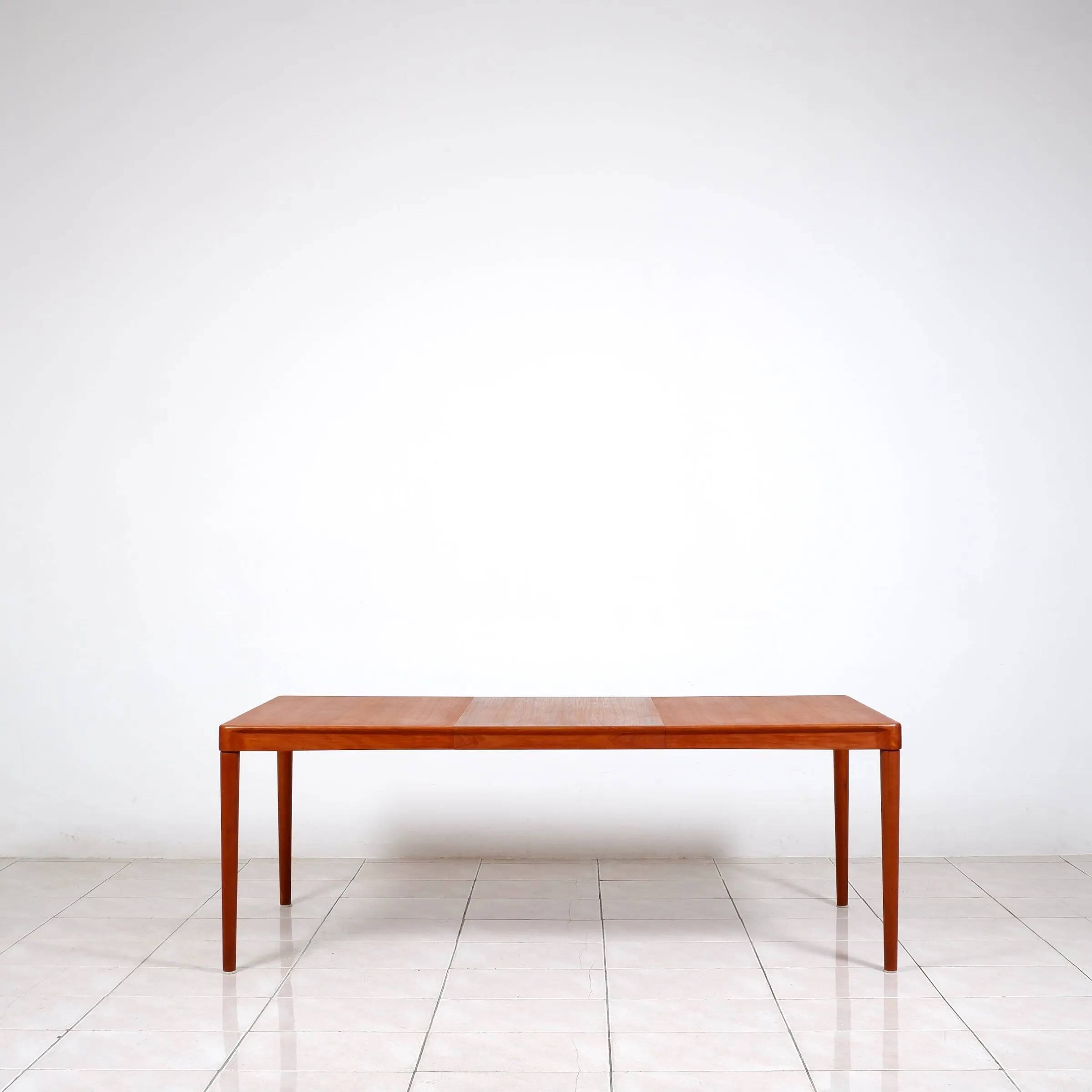 Extendable dining table in teak by H. W. Klein for Bramin Mobler