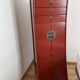 Red high cabinet Aldaba Madrid – 9 drawers and cupboard