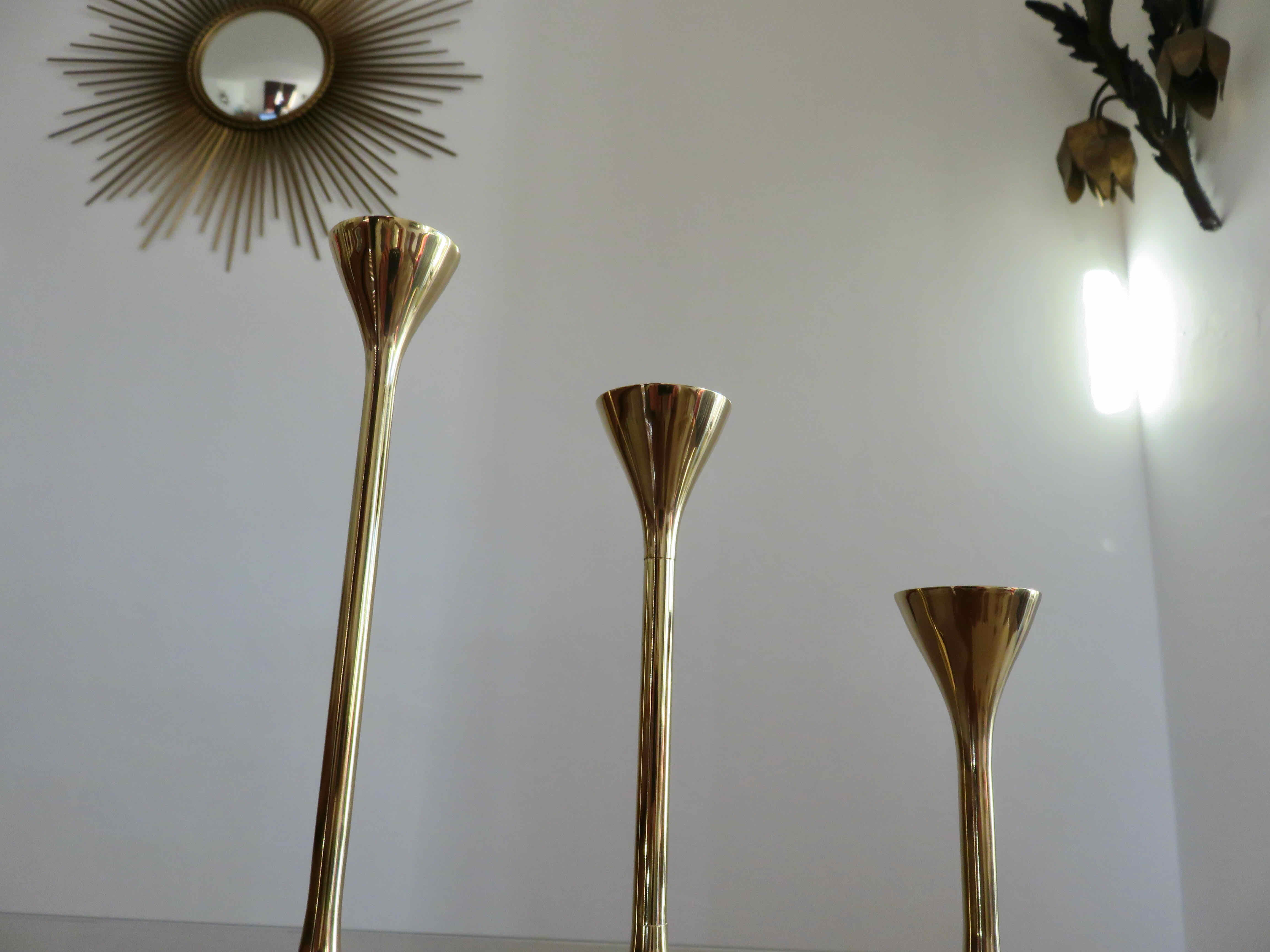 Series of 3 Scandinavian brass candle holders, 70s tulip foot