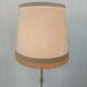Lampadaire tripode métal doré