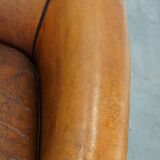 Sheep leather club chair with patina