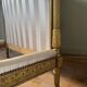 Pair of late 19th-century gilded wooden beds in Louis XVI style.