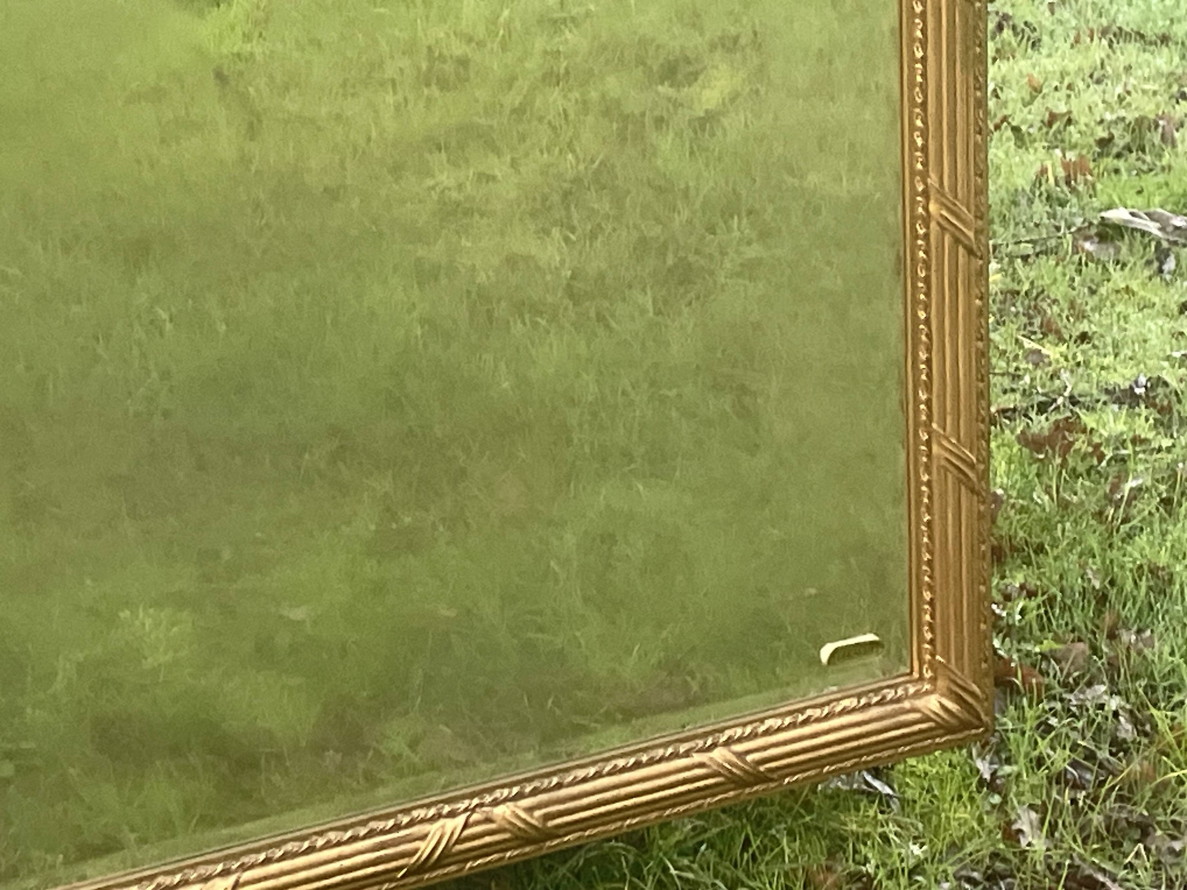 Imposing neo-classical style mirror, wood and stucco "Deknudt"