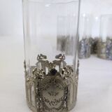 Glass with art deco strapping