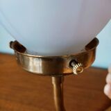 Brass wall lamp with pale pink bell