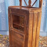 Glass-fronted entrance cabinet in Burmese teak