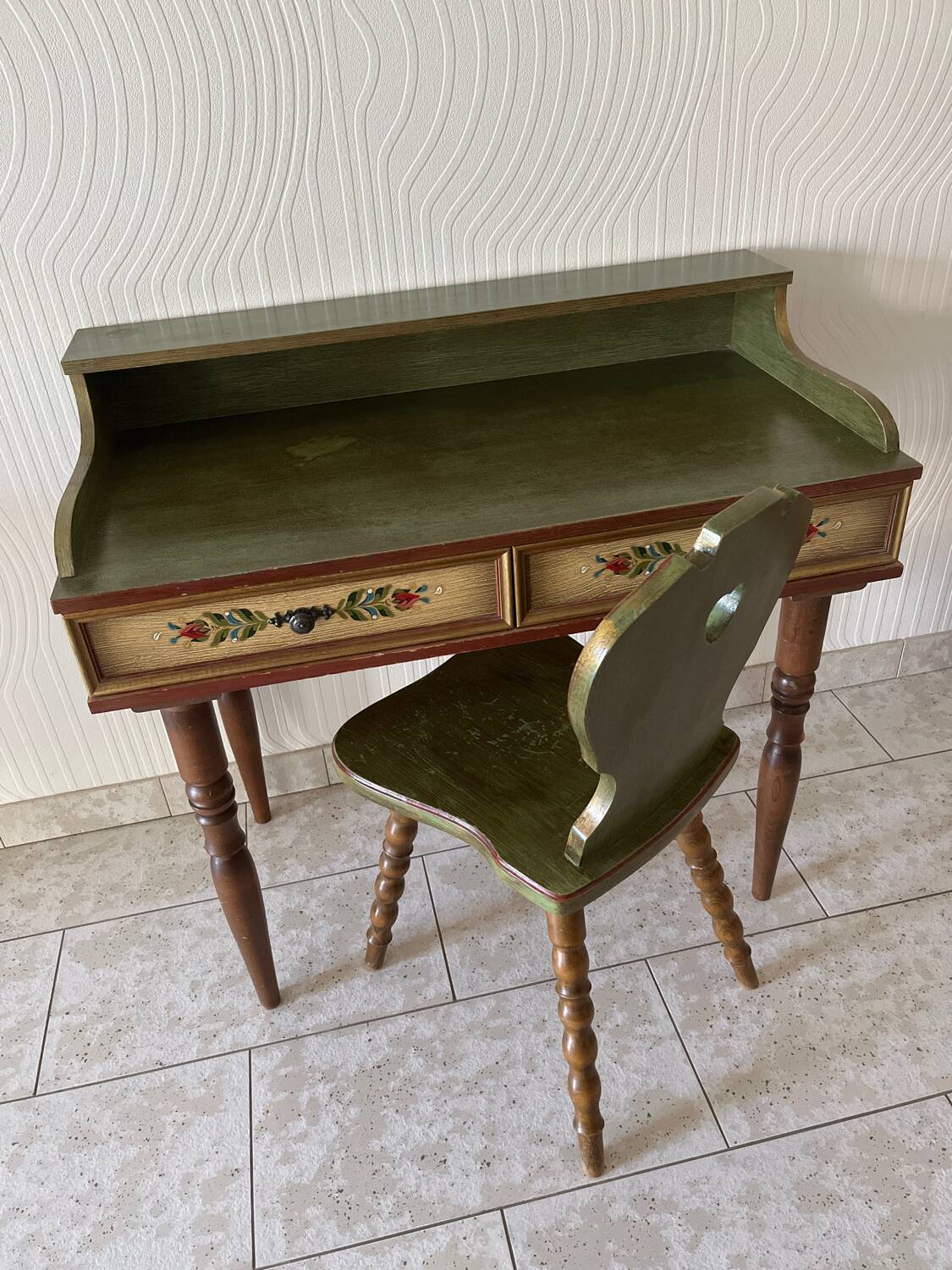 Wooden dressing table with olive green chair and floral patterns