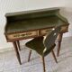 Wooden dressing table with olive green chair and floral patterns