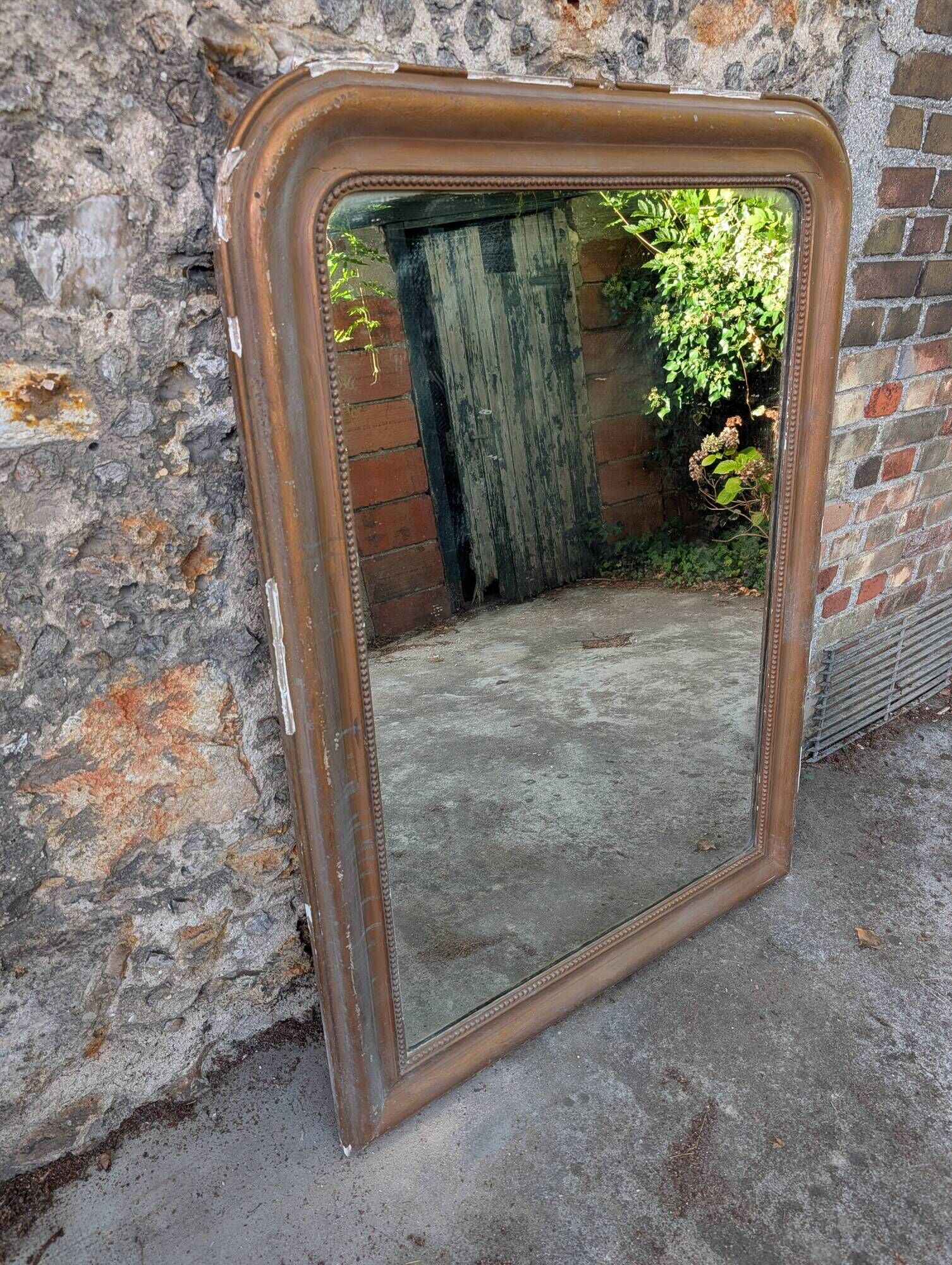 Antique Louis-Philippe trumeau gilded with beaded moulding & lovely patina