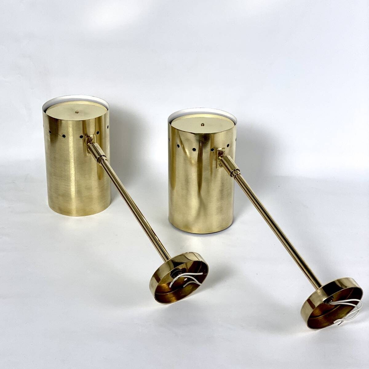Large pair of brass wall or ceiling lights, 1960.