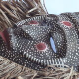 African mask with raffia and kaolin dots