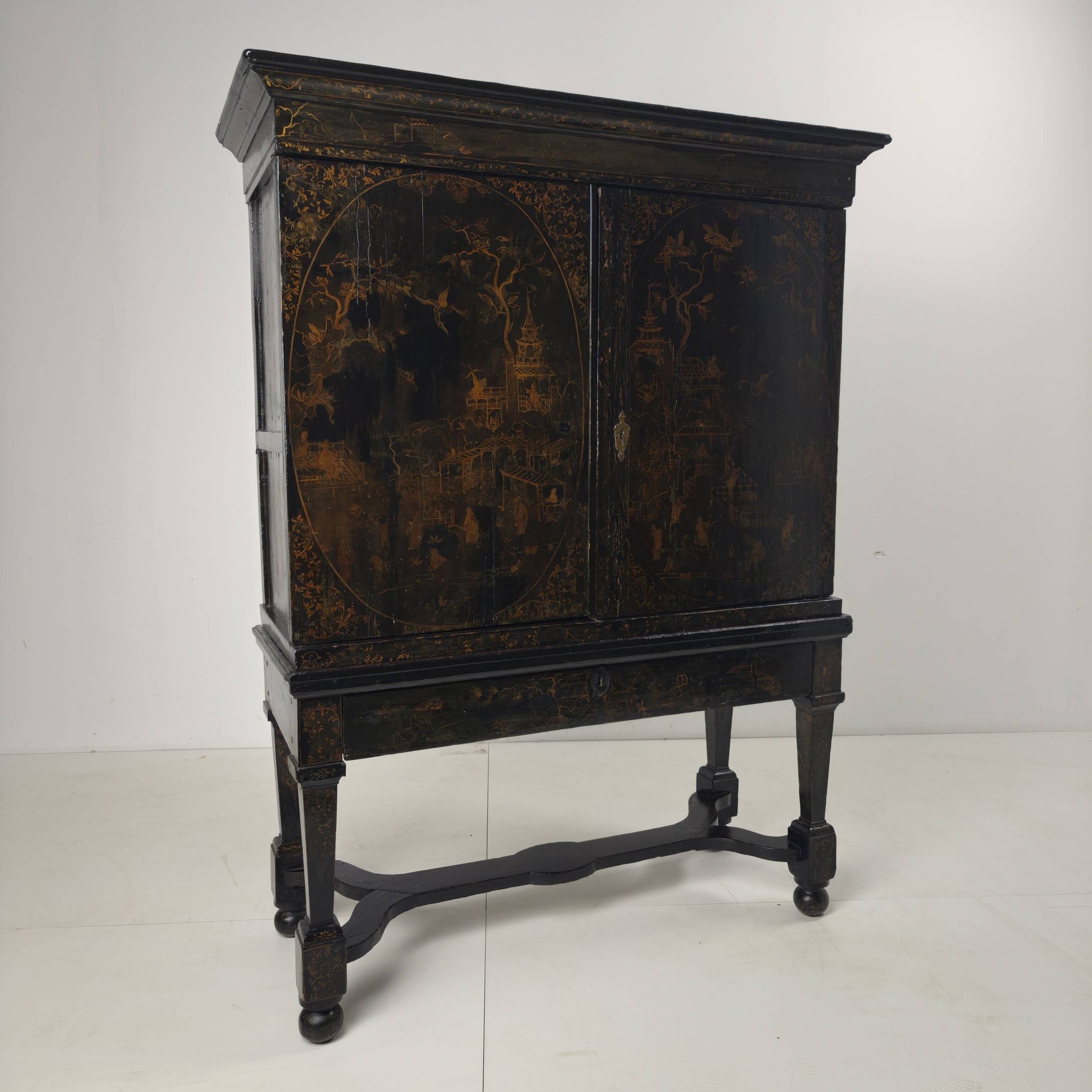 A rare early 18th-century Dutch japanned chinoiserie cabinet, circa 1700