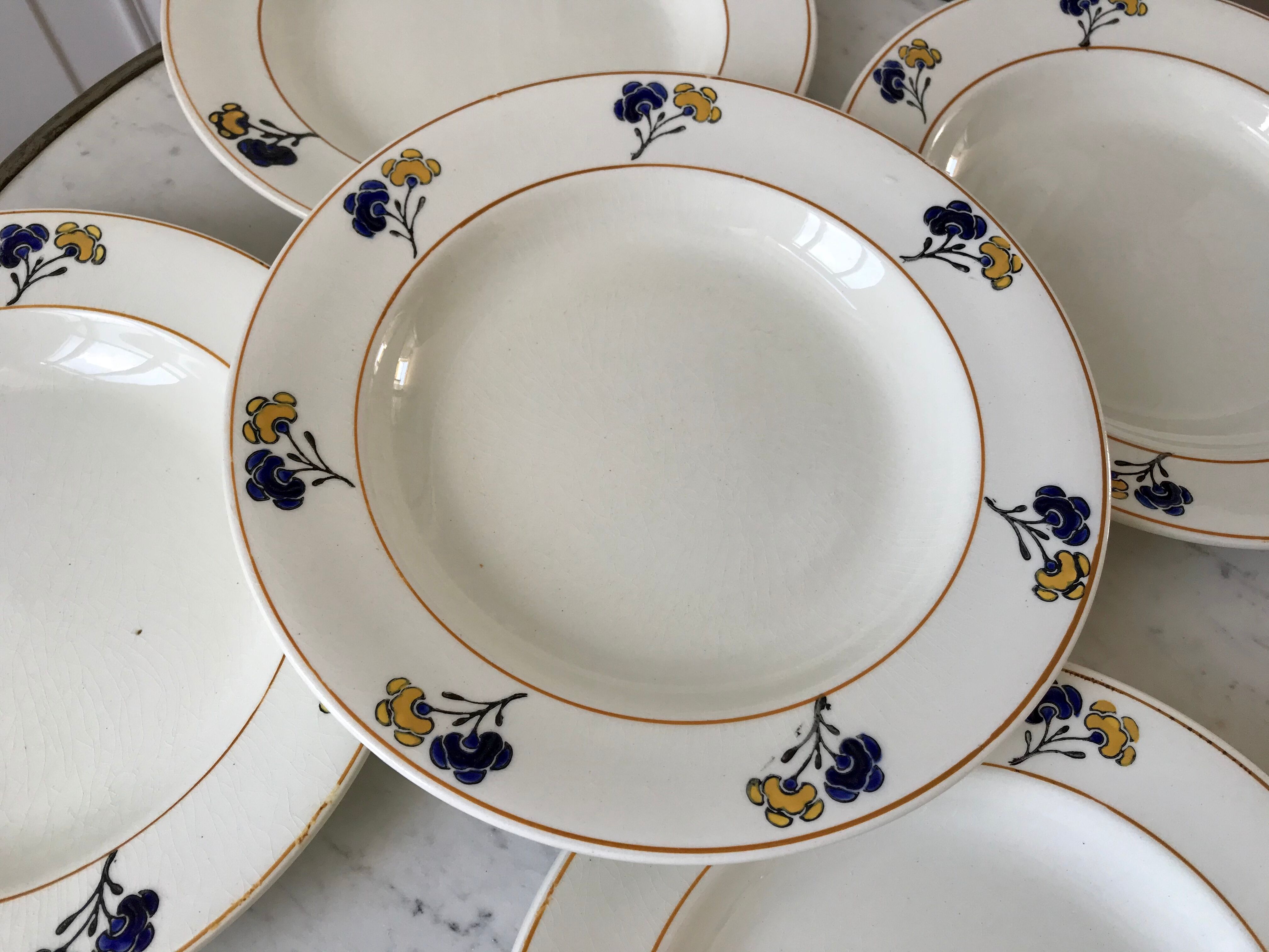 Set of 5 hollow plates Iron Earth model "Romeo" early XXth