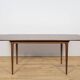 Extendable teak dining table in Mid-Century style from McIntosh, UK.