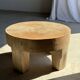 Coffee table, four-legged low table in natural solid monoxyle mango wood.