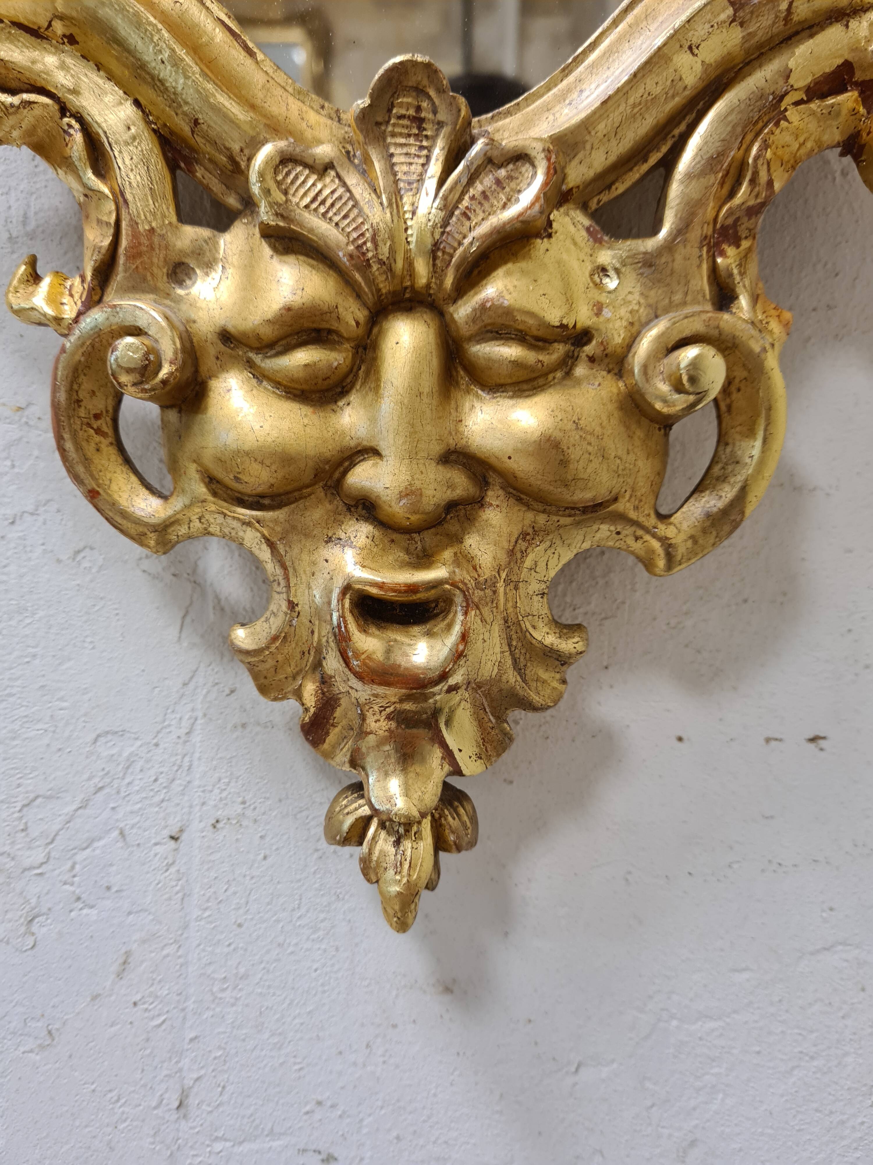 Antique baroque gilded mirror in carved wood, 18th century