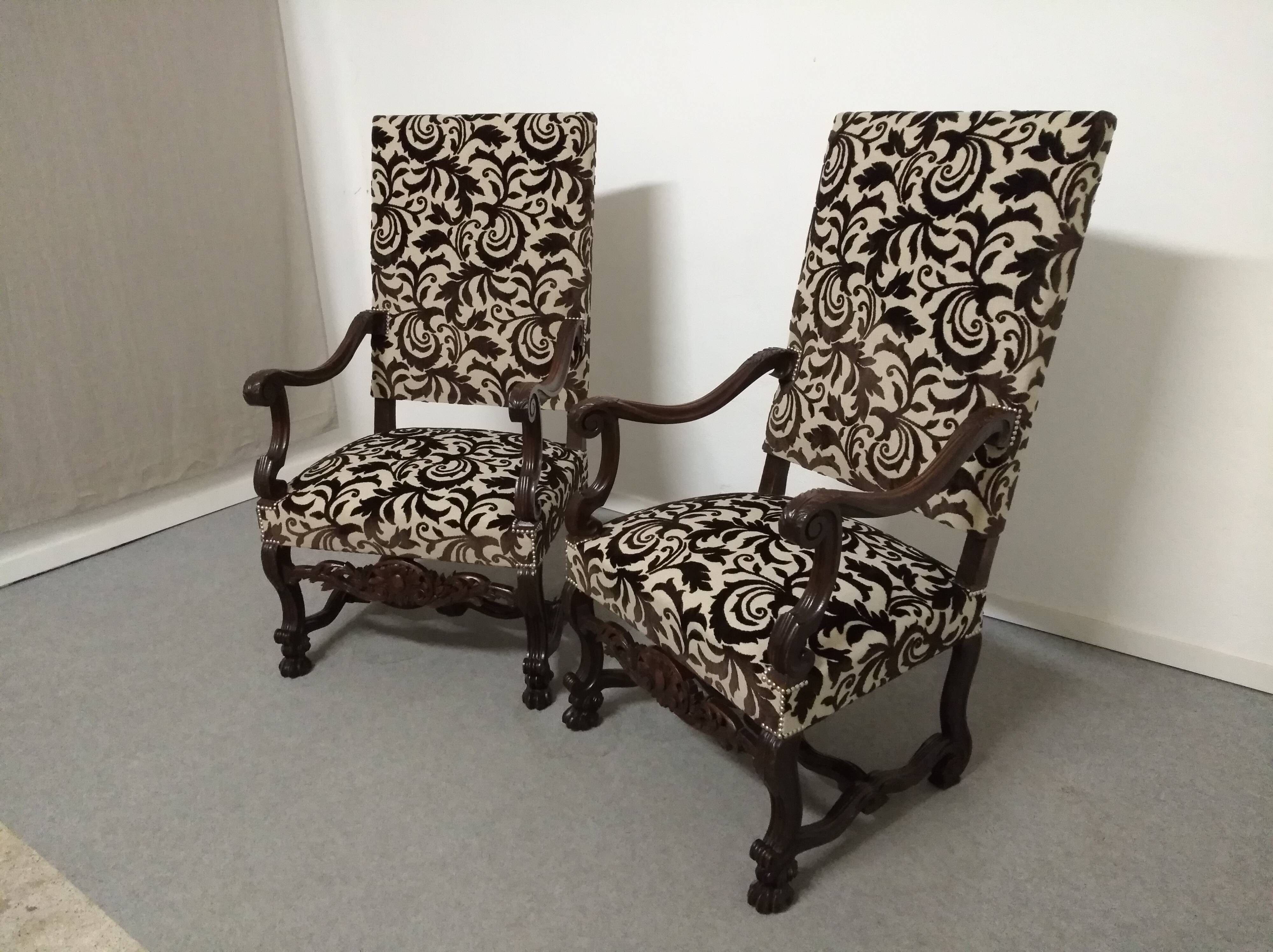 Pair of ceremonial armchairs in blackened oak, France late 18th century.