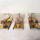Set of 3 smoked glass and brass wall sconce lamps