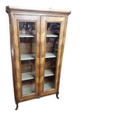 Two-door display cabinet in transitional style.