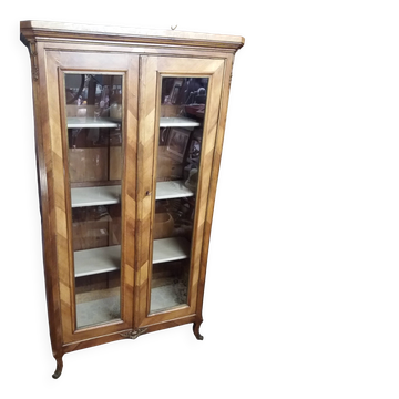 Two-door display cabinet in transitional style.