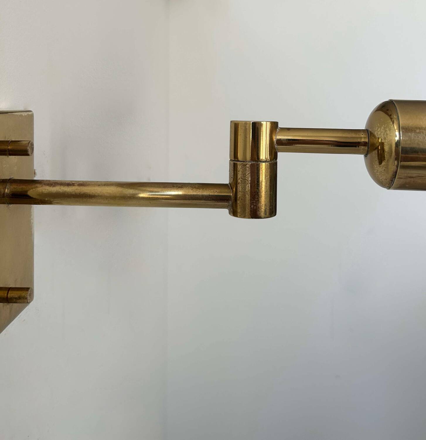 Vintage adjustable wall lamp, solid brass, France 1970