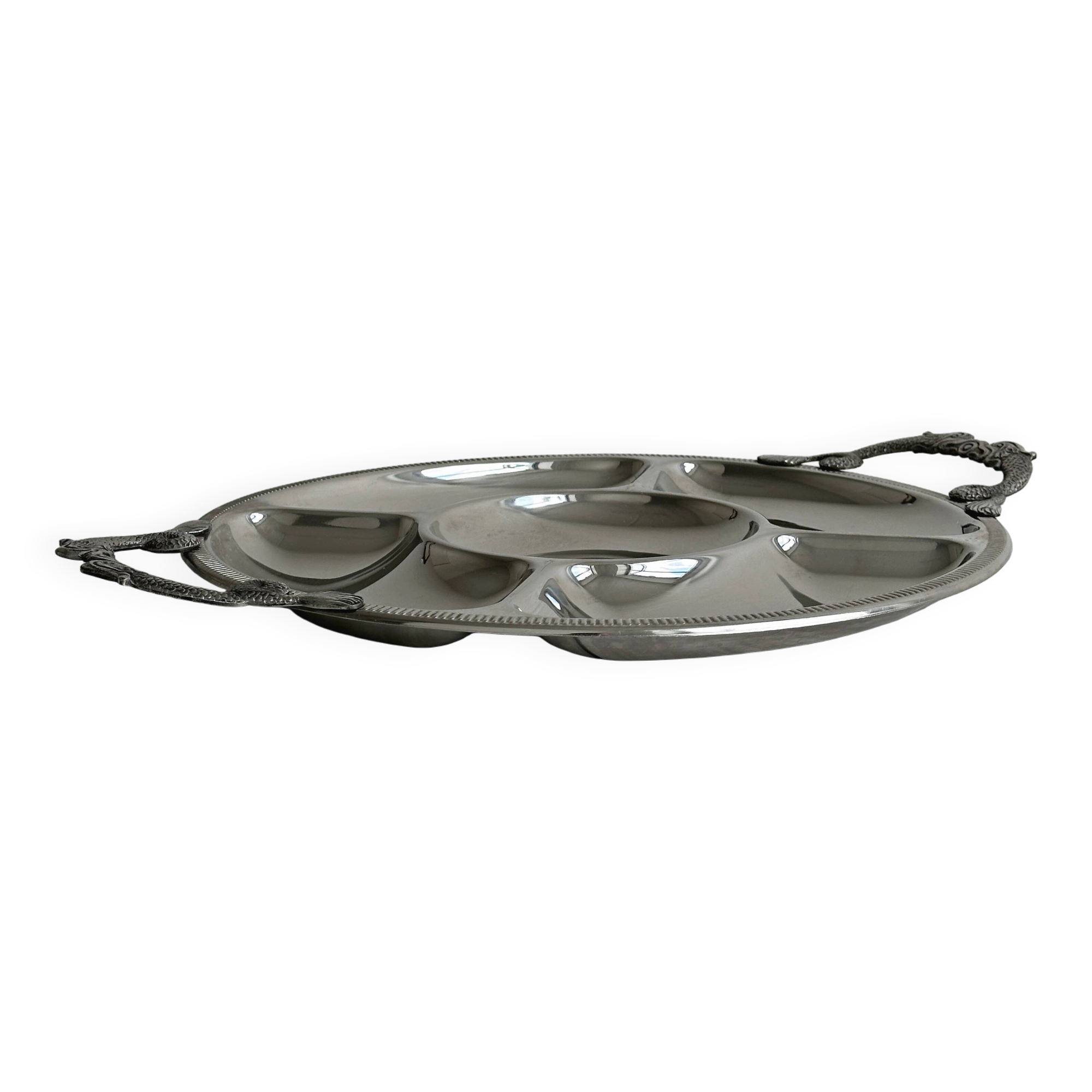 Vintage silver-plated metal serving tray with compartments.