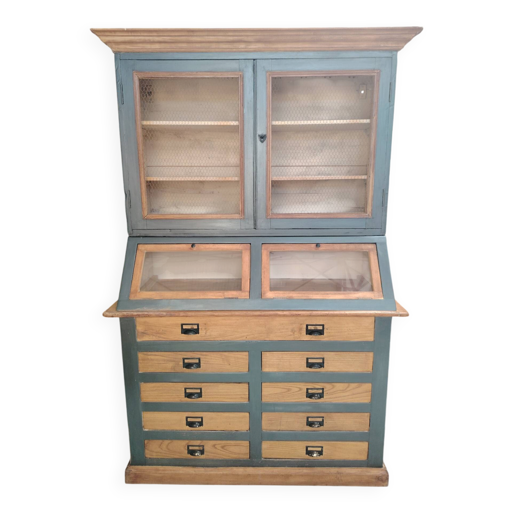 Large two-body grain merchant cabinet made of solid wood.