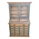 Large two-body grain merchant cabinet made of solid wood.