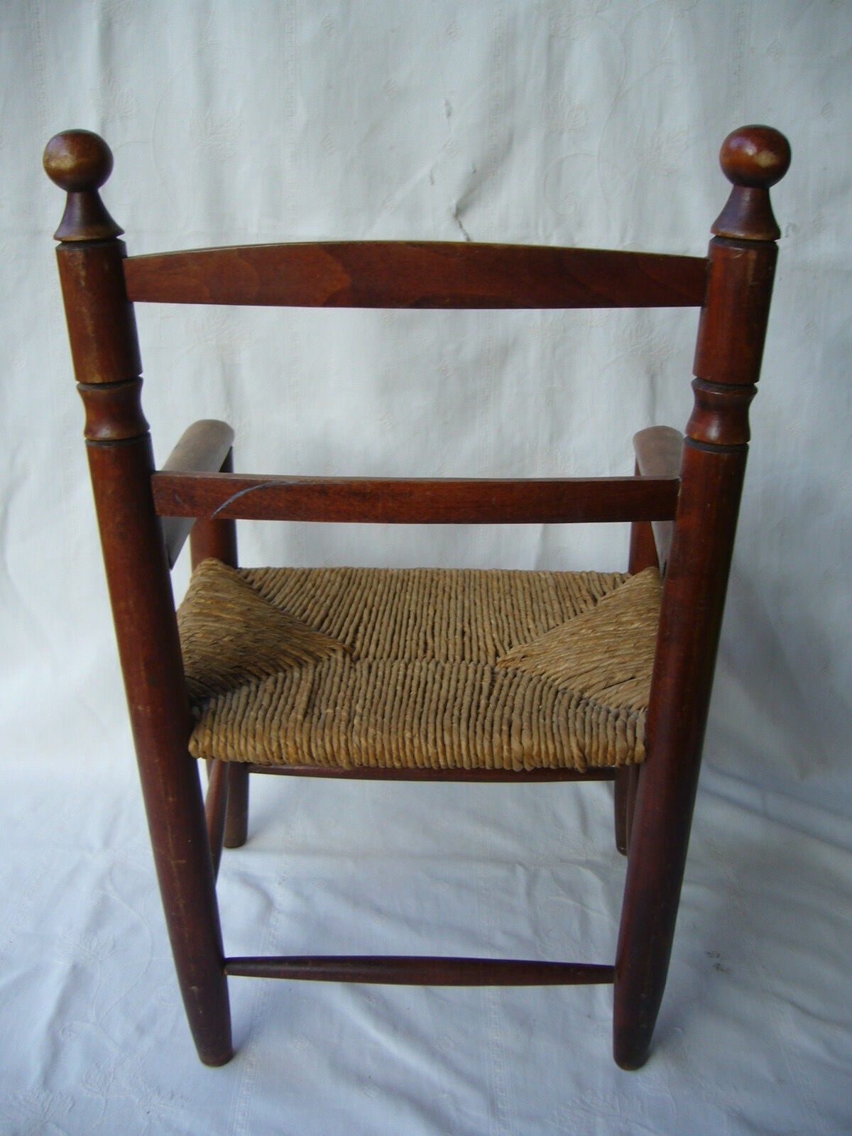 Wooden child's chair and mulched seat