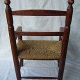 Wooden child's chair and mulched seat