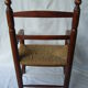 Wooden child's chair and mulched seat