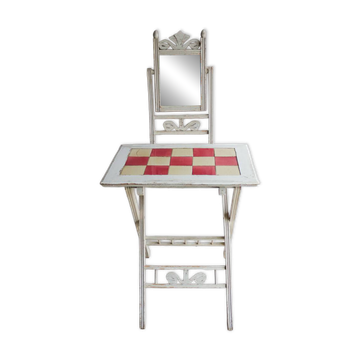 Small antique folding wooden dressing table with tiles and a mercury mirror.