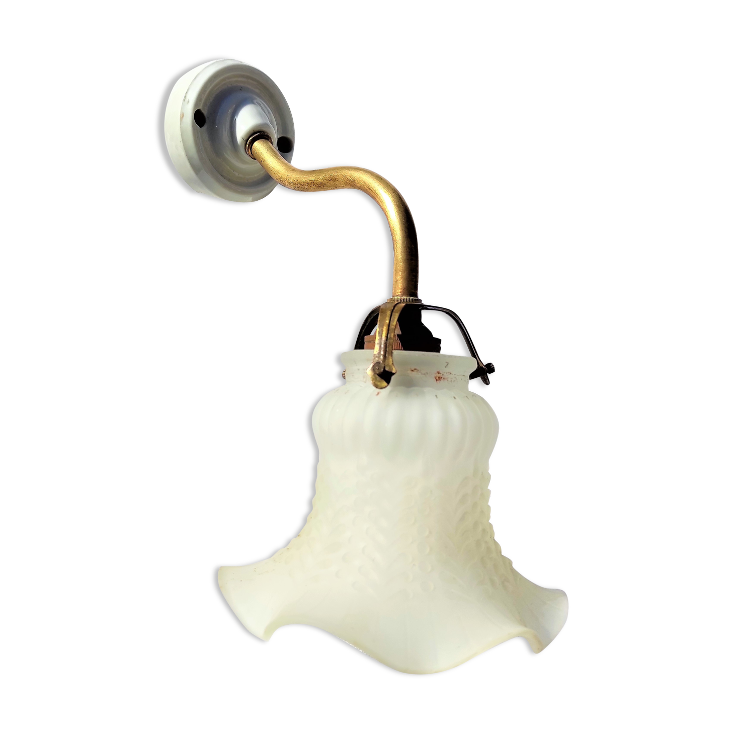 Brass gooseneck wall lamp, with brass socket and porcelain base.